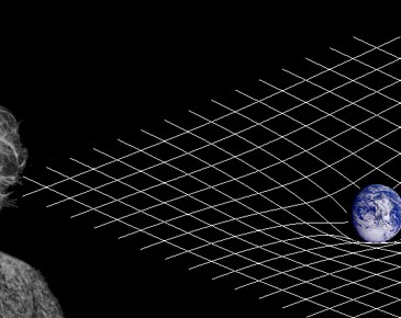 Einstein con una representación del espacio tiempo